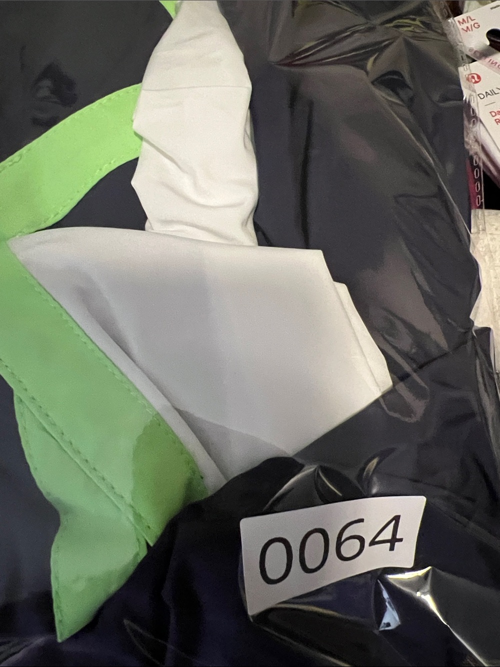 FP Movement Cares By The Wind block Logo in Navy and Lime Green Jacket. - Picture 13 of 13